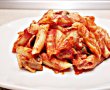 Penne gratinate cu sunca,ciuperci,cascaval si sos de rosii-1