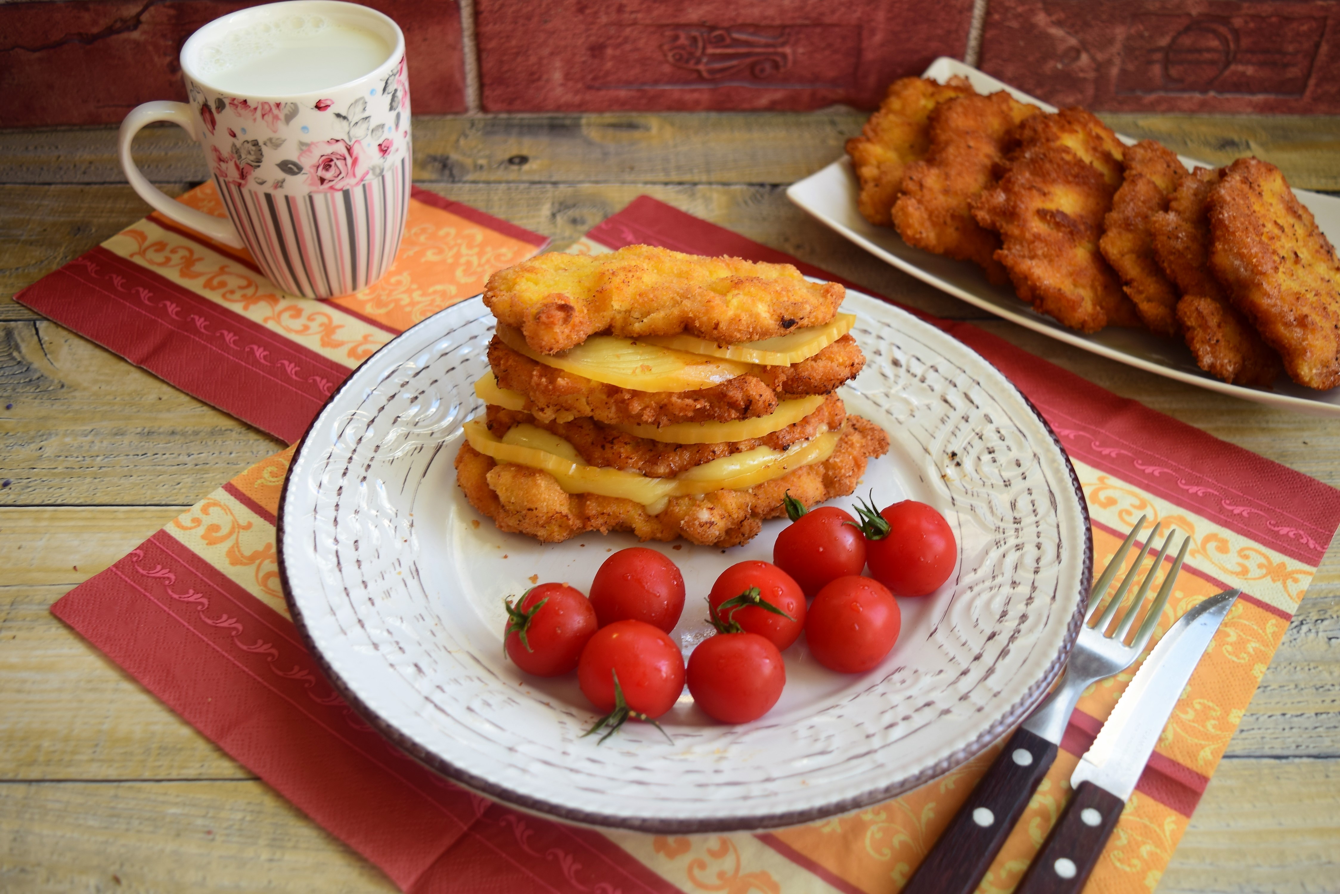 Snitele de porc in crusta de pesmet cu parmezan